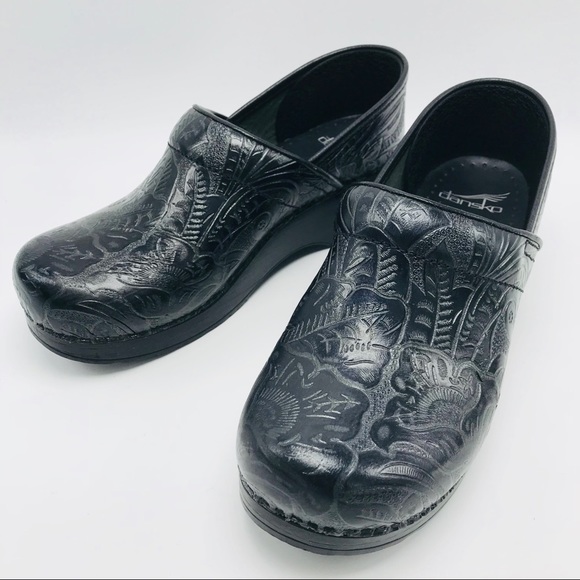 dansko black tooled leather clogs